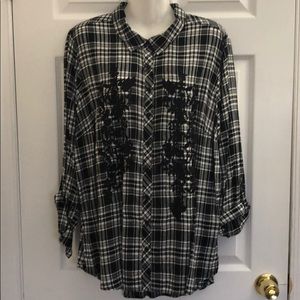 Woman’s plaid button down top